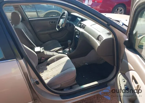 1999 Toyota Camry Le from USA, damaged, VIN 4T1BG22K2XU441805